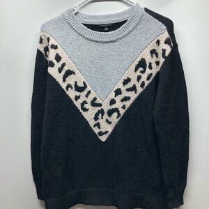 Staccato brand women’s sweater    This is a size XS and is 100% polyester